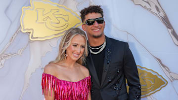 Kansas City Chiefs quarterback Patrick Mahomes and wife Brittany pose for a photo on the red carpet at the Nelson Art Gallery. 