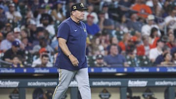 May 19, 2024; Houston, Texas, USA; Milwaukee Brewers manager Pat Murphy (21) walks to the mound for a pitching change during the fifth inning against the Houston Astros at Minute Maid Park. Mandatory Credit: Troy Taormina-USA TODAY Sports