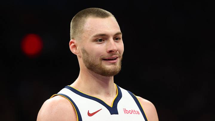 Mar 24, 2026; Phoenix, Arizona, USA; Denver Nuggets guard Christian Braun (0) against the Phoenix Suns at Mortgage Matchup Center. Mandatory Credit: Mark J. Rebilas-Imagn Images