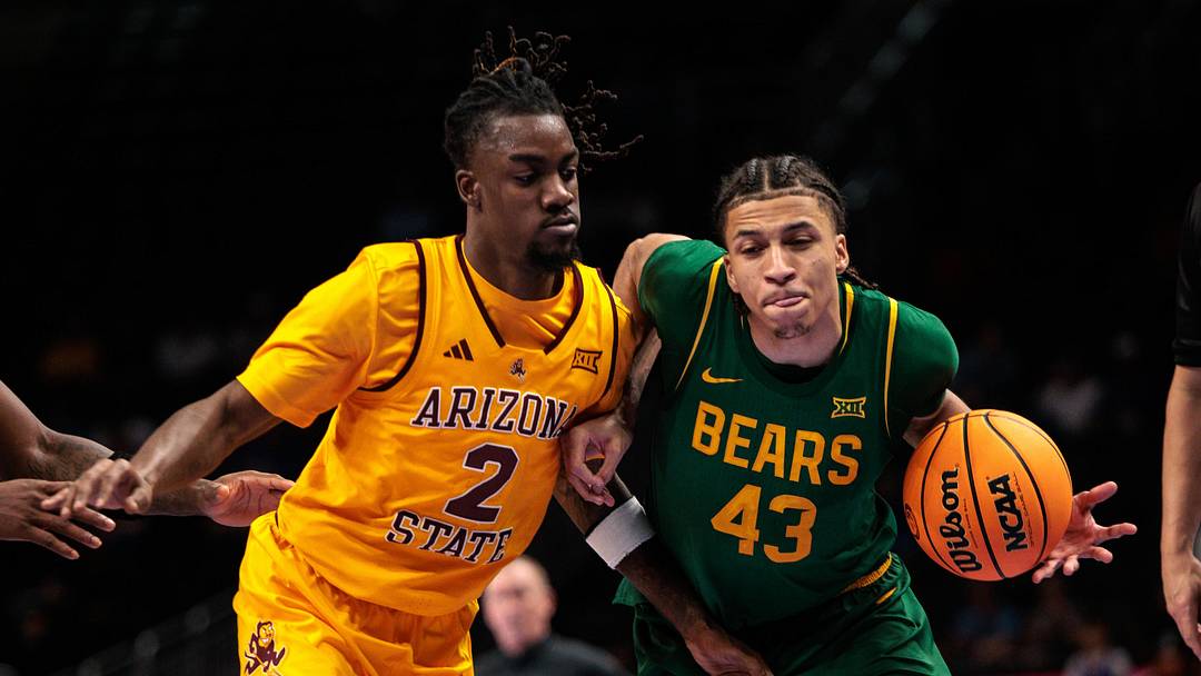 Baylor Bears guard Cameron Carr (43) drives around Arizona State Sun Devils guard Anthony Johnson (2) during the second half at T-Mobile Center