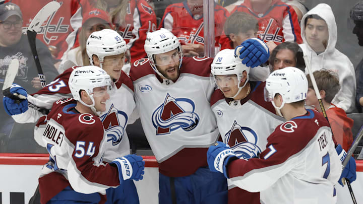 Colorado Avalanche players Nicolas Roy (10), Gavin Brindley (54), Zakhar Bardakov (93), Devon Toews (7), and Sam Malinski (70)