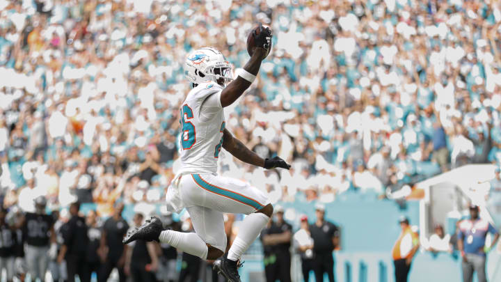 Miami Dolphins running back Salvon Ahmed (26) reacts after scoring a touchdown against the Las Vegas Raiders during the second quarter at Hard Rock Stadium last season.