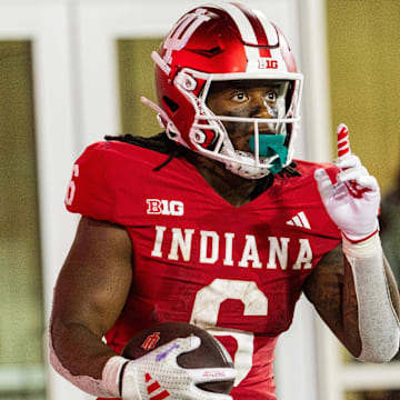 Indiana Hoosiers running back Justice Ellison (6) celebrates his touchdown against Western Illinois at Memorial Stadium. 