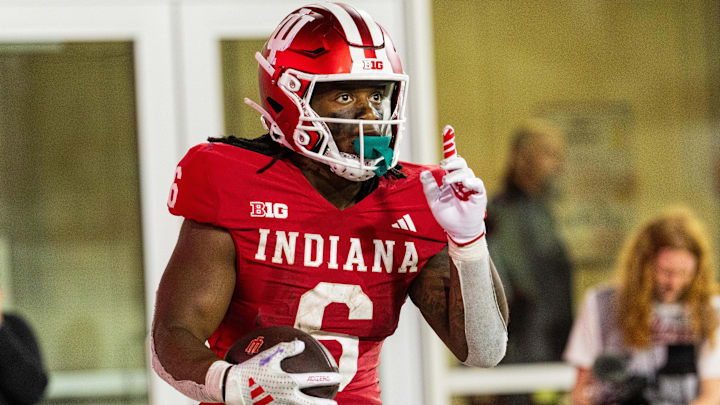 Indiana Hoosiers running back Justice Ellison (6) celebrates his touchdown against Western Illinois at Memorial Stadium. 