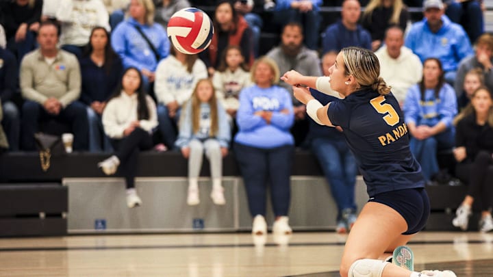 Notre Dame's Dara Jackson (5) passes the ball against St. Henry in the first set in the Ninth Region volleyball final at Ryle High School Oct. 29, 2025.