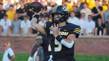Aug 28, 2025; Columbia, Missouri, USA; Missouri Tigers quarterback Beau Pribula (9) throws a pass against the Central Arkansas Bears during the first half of the game at Faurot Field at Memorial Stadium. Mandatory Credit: Denny Medley-Imagn Images
