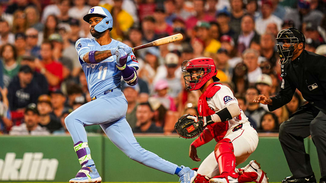 Aug 5, 2025; Boston, Massachusetts, USA; Kansas City Royals third base Maikel Garcia (11) hits a double to drive in a run against the Boston Red Sox in the fourth inning at Fenway Park. Mandatory Credit: David Butler II-Imagn Images