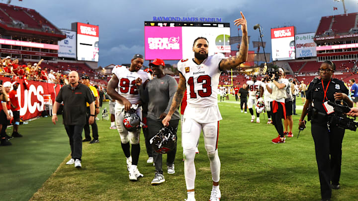 Tampa Bay Buccaneers wide receiver Mike Evans (13) greets the fans after they beat the Washington Commanders at Raymond James Stadium.
