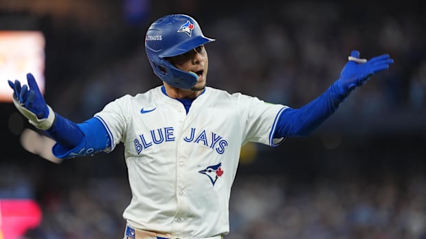 Toronto Blue Jays second baseman Andres Gimenez (0) reacts after a sacrifice bunt