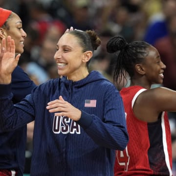 United States power forward Alyssa Thomas (14) and shooting guard Diana Taurasi (12) celebrate 