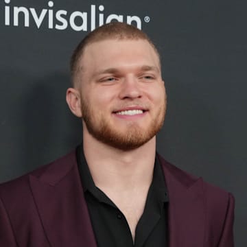 Aidan Hutchinson on the red carpet before Super Bowl LIX NFL Honors at Saenger Theatre