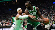 New York Knicks guard Josh Hart (3) defends Boston Celtics guard Jaylen Brown (7) during the first half at TD Garden.