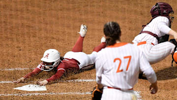 Emma Lemley, pictured in front wearing #27, has become a force for Virginia Tech softball, continuing the program's legacy of great pitching.