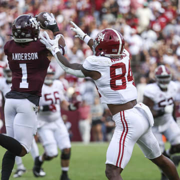 Oct 7, 2023; College Station, Texas, USA; Texas A&M Aggies defensive back Bryce Anderson (1) intercepts a pass intended for Alabama Crimson Tide tight end Amari Niblack (84) during the third quarter at Kyle Field. Mandatory Credit: Troy Taormina-USA TODAY Sports