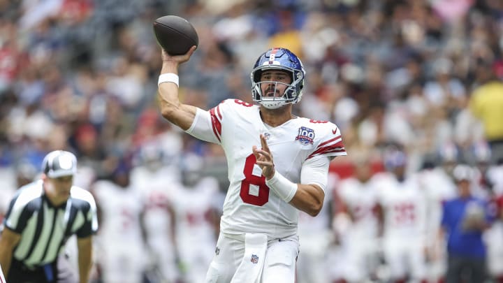 Aug 17, 2024; Houston, Texas, USA; New York Giants quarterback Daniel Jones (8) attempts a pass during the second quarter against the Houston Texans at NRG Stadium. Mandatory Credit: Troy Taormina-USA TODAY Sports