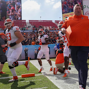 Jan 2, 2023; Tampa, FL, USA; Illinois Fighting Illini head coach Bret Bielema takes the field fro the  the 2023 ReliaQuest Bowl against the Mississippi State Bulldogs  at Raymond James Stadium. Mandatory Credit: Nathan Ray Seebeck-Imagn Images