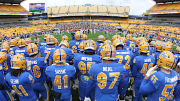 Nov 16, 2024; Pittsburgh, Pennsylvania, USA;  The Pittsburgh Panthers take the field to warm up against the Clemson Tigers at Acrisure Stadium. Mandatory Credit: Charles LeClaire-Imagn Images