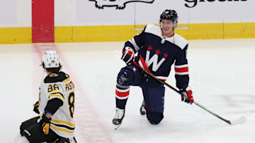 Apr 8, 2021; Washington, District of Columbia, USA; Boston Bruins right wing David Pastrnak (88) talks with Washington Capitals left wing Jakub Vrana (13) during warmups prior to their game at Capital One Arena. Mandatory Credit: Geoff Burke-Imagn Images