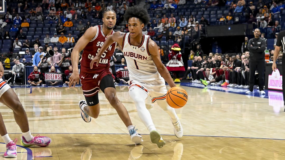 Mar 15, 2024; Nashville, TN, USA; Auburn Tigers guard Aden Holloway (1) drives to the basket against