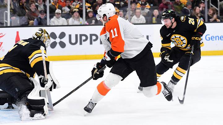 Jan 29, 2026; Boston, Massachusetts, USA; Boston Bruins goaltender Jeremy Swayman (1) makes a save on Philadelphia Flyers right wing Travis Konecny (11) during the second period at TD Garden. Mandatory Credit: Bob DeChiara-Imagn Images