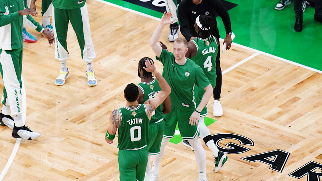 Jun 17, 2024; Boston, Massachusetts, USA; Boston Celtics forward Sam Hauser (30) reacts with guard Jaylen Brown (7) and forward Jayson Tatum (0) in the third quarter against the Dallas Mavericks during game five of the 2024 NBA Finals at TD Garden. Mandatory Credit: David Butler II-Imagn Images Jun 17, 2024; Boston, Massachusetts, USA; Boston Celtics forward Sam Hauser (30) reacts with guard Jaylen Brown (7) and forward Jayson Tatum (0) in the third quarter against the Dallas Mavericks during game five of the 2024 NBA Finals at TD Garden. Mandatory Credit: David Butler II-Imagn Images