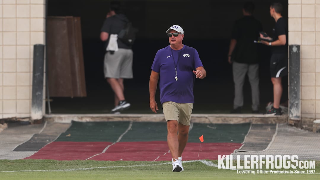 TCU Head Football Coach Sonny Dykes head out to the practice field