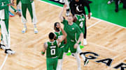 Jun 17, 2024; Boston, Massachusetts, USA; Boston Celtics forward Sam Hauser (30) reacts with guard Jaylen Brown (7) and forward Jayson Tatum (0) in the third quarter against the Dallas Mavericks during game five of the 2024 NBA Finals at TD Garden. Mandatory Credit: David Butler II-Imagn Images