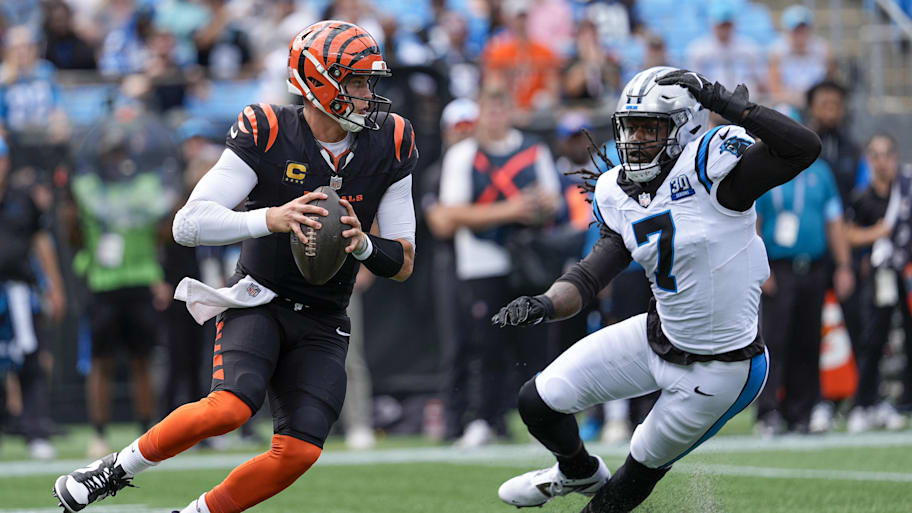Sep 29, 2024; Charlotte, North Carolina, USA; Carolina Panthers linebacker Jadeveon Clowney (7) pressures Cincinnati Bengals quarterback Joe Burrow (9) during 1st quarter at Bank of America Stadium. Mandatory Credit: Jim Dedmon-Imagn Images | Jim Dedmon-Imagn Images