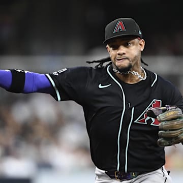 Jul 8, 2025; San Diego, California, USA; Arizona Diamondbacks second baseman Ketel Marte (4) throws San Diego Padres left fielder Gavin Sheets (30) out at first base during the fifth inning at Petco Park. Mandatory Credit: Denis Poroy-Imagn Images