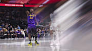 Jan 7, 2025; Dallas, Texas, USA; (Editor's Note: A filter was used in the creation of this image.) Los Angeles Lakers forward LeBron James (23) shoots during the second half against the Dallas Mavericks at American Airlines Center. 