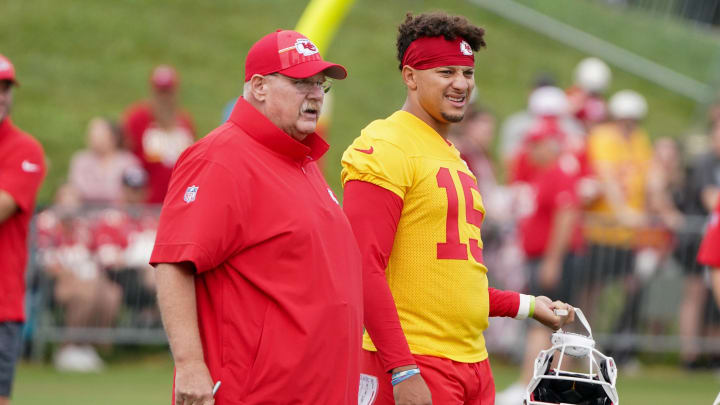 Jul 24, 2023; St. Joseph, MO, USA; Kansas City Chiefs quarterback Patrick Mahomes (15) and head coach Andy Reid watch drills during training camp at Missouri Western State University. Mandatory Credit: Denny Medley-USA TODAY Sports