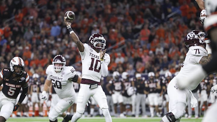 Dec 27, 2023; Houston, TX, USA; Texas A&M Aggies quarterback Marcel Reed (10) passes the ball during the third quarter against the Oklahoma State Cowboys at NRG Stadium. Mandatory Credit: Troy Taormina-Imagn Images