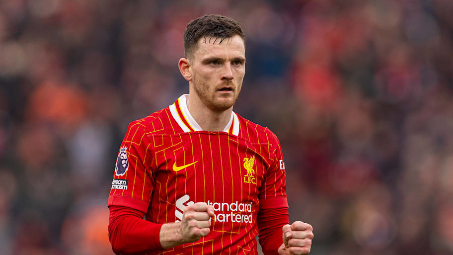 Andy Robertson with clenched fists for Liverpool.