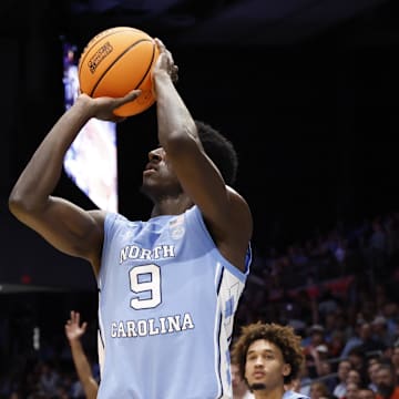 Mar 18, 2025; Dayton, OH, USA; North Carolina Tar Heels guard Drake Powell (9) shoots the ball in the second half against the San Diego State Aztecs at UD Arena. Mandatory Credit: Rick Osentoski-Imagn Images