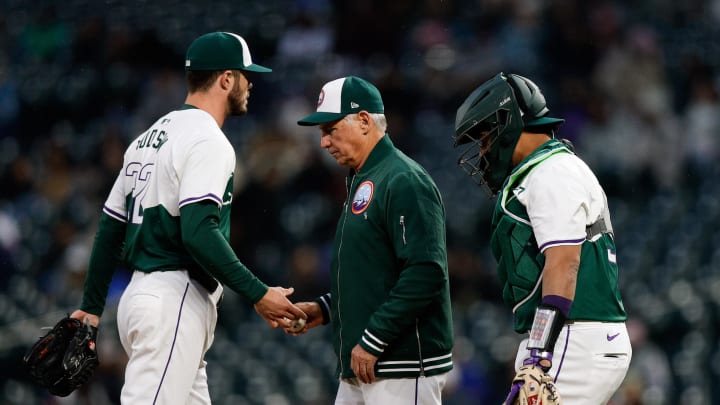 Apr 20, 2024; Denver, Colorado, USA; Colorado Rockies starting pitcher Dakota Hudson (32) is pulled by manager Bud Black (10) as catcher Elias Diaz (35) looks on in the fifth inning against the Seattle Mariners at Coors Field. Mandatory Credit: Isaiah J. Downing-USA TODAY Sports