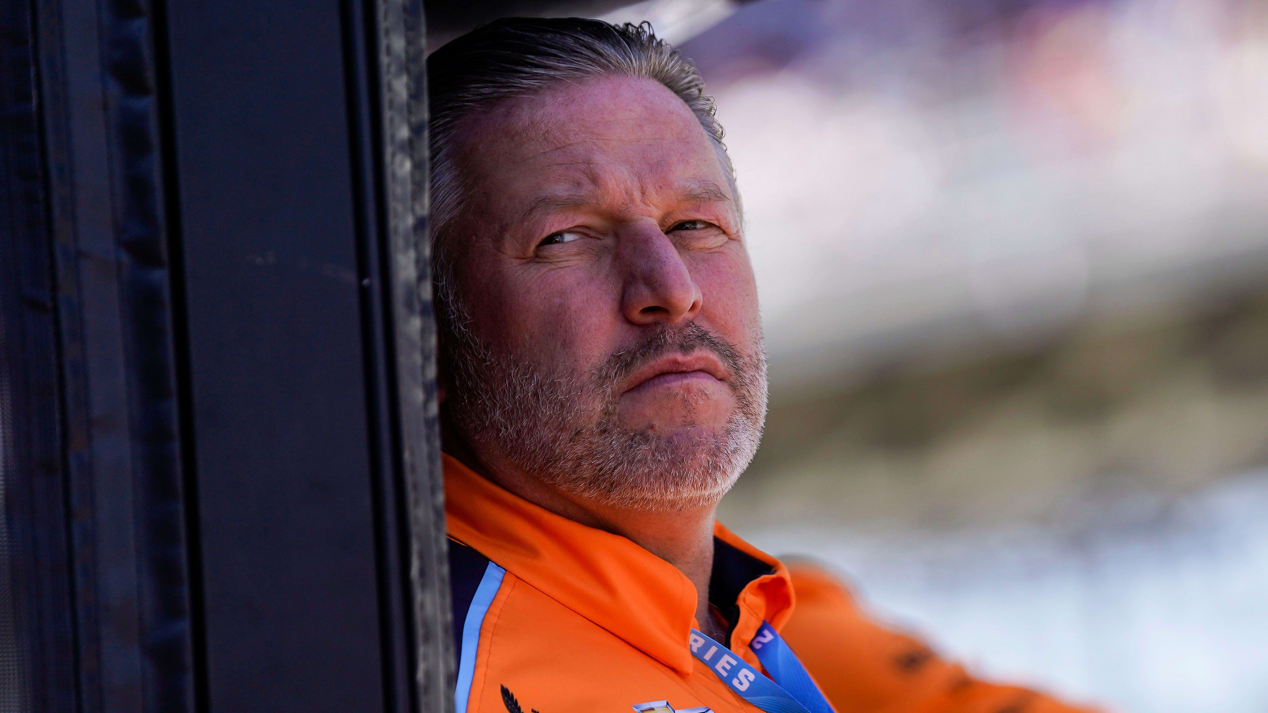 Chief Executive Officer of the McLaren Zak Brown stands in Arrow McLaren SP driver Felix Rosenqvist