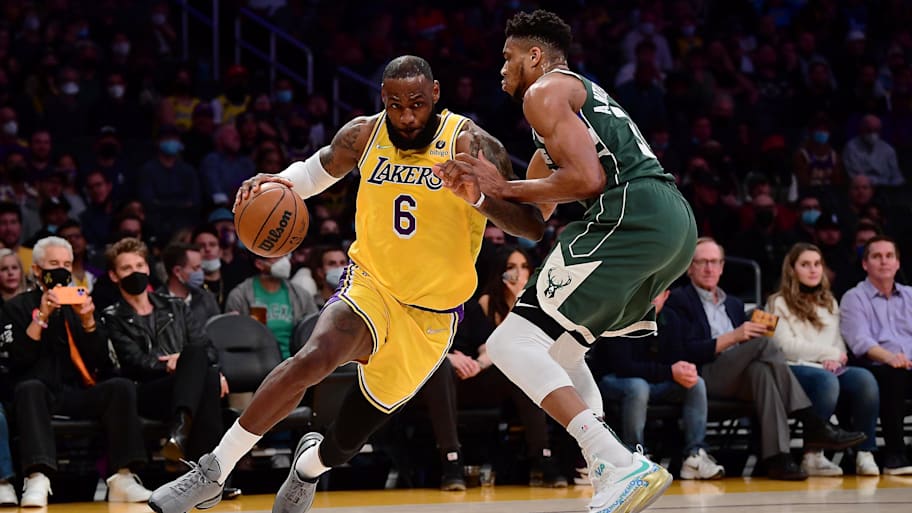 Los Angeles Lakers forward LeBron James and Milwaukee Bucks forward Giannis Antetokounmpo on Feb 8, 2022. | Gary A. Vasquez-Imagn Images