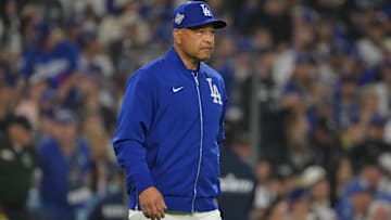 Oct 27, 2025; Los Angeles, California, USA; Los Angeles Dodgers manager Dave Roberts (30) walks to the mound in the fifth inning against the Toronto Blue Jays during game three of the 2025 MLB World Series at Dodger Stadium. Mandatory Credit: Jayne Kamin-Oncea-Imagn Images