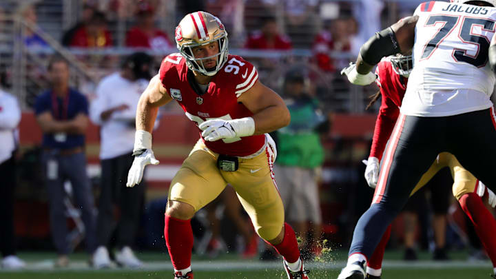 Sep 29, 2024; Santa Clara, California, USA; San Francisco 49ers defensive end Nick Bosa (97) rushes the passer during the third quarter against the New England Patriots at Levi's Stadium. Mandatory Credit: Sergio Estrada-Imagn Images