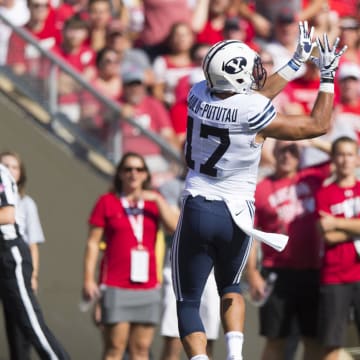 Sep 15, 2018; Madison, WI, USA;  BYU Cougars tight end Moroni Laulu-Pututau (17) catches a pass for a touchdown during the second quarter against the Wisconsin Badgers at Camp Randall Stadium.