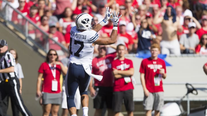 Sep 15, 2018; Madison, WI, USA;  BYU Cougars tight end Moroni Laulu-Pututau (17) catches a pass for a touchdown during the second quarter against the Wisconsin Badgers at Camp Randall Stadium.