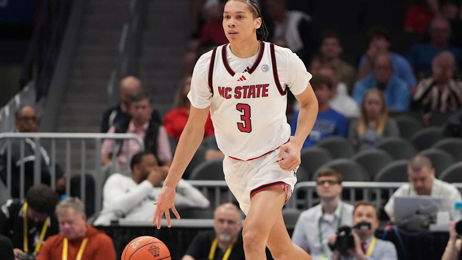 NC State guard Matt Able brings the ball up the court.