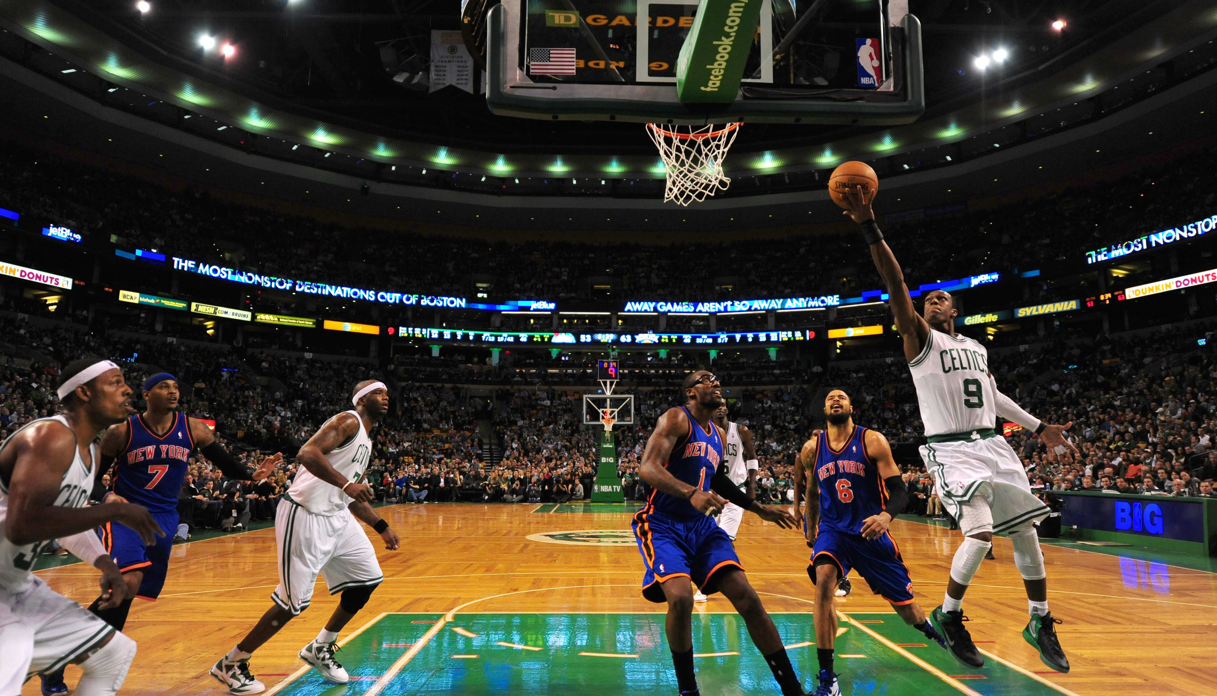 February 3, 2012; Boston, MA, USA; Boston Celtics forward Rajon Rondo (9) scores on a layup against the New York Knicks.