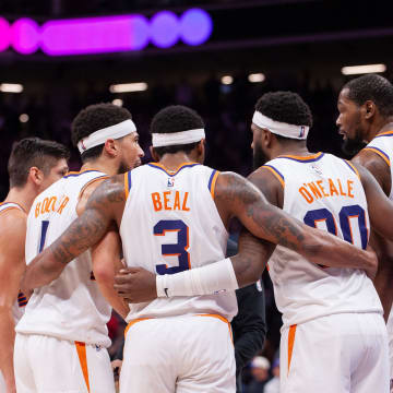 Apr 12, 2024; Sacramento, California, USA; Phoenix Suns guard Grayson Allen (8) and guard Devin Booker (1) and guard Bradley Beal (3) and forward Royce O'Neale (00) and forward Kevin Durant (35) huddle up before the final seconds of the fourth quarter at Golden 1 Center. Mandatory Credit: Ed Szczepanski-USA TODAY Sports