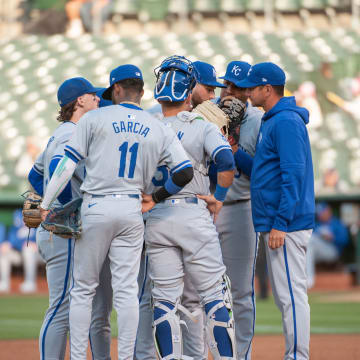 Jun 18, 2024; Oakland, California, USA; Kansas City Royals pitching coach Brian Sweeney (85) visits the mound to speak with the infield players during the third inning against the Oakland Athletics at Oakland-Alameda County Coliseum.