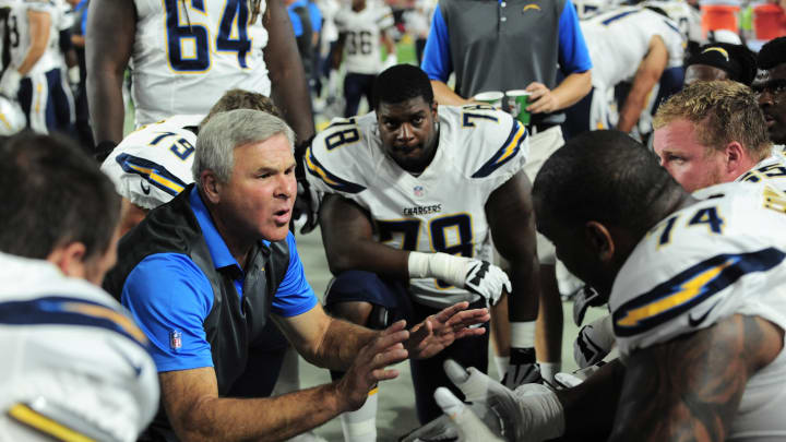 Aug 22, 2015; Glendale, AZ, USA; San Diego Chargers offensive line coach Joe D'Alessandris talks with players against the Arizona Cardinals at University of Phoenix Stadium. The Chargers won 22-19. Mandatory Credit: Joe Camporeale-USA TODAY Sports