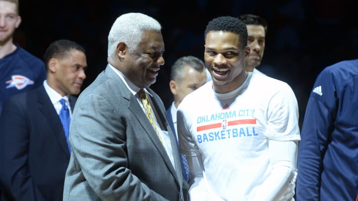 Apr 12, 2017; Oklahoma City, OK, USA; NBA great Oscar Robertson (left) congratulates Oklahoma City Thunder guard Russell Westbrook (0) prior to game against the Denver Nuggets at Chesapeake Energy Arena. 