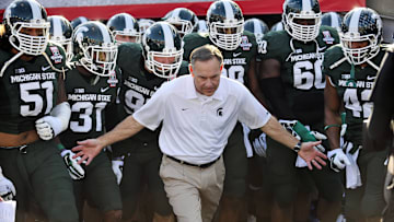 January 1, 2014; Pasadena, CA, USA; Michigan State Spartans head coach Mark Dantonio leads the Spartans to play against the Stanford Cardinal at Rose Bowl. Mandatory Credit: Gary A. Vasquez-Imagn Images
