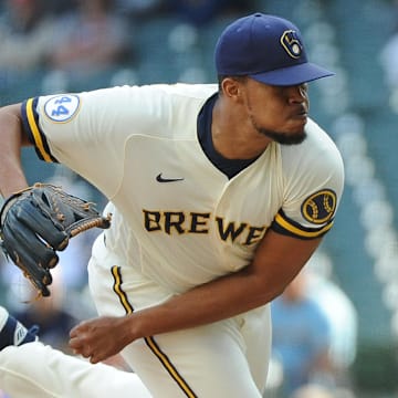 May 13, 2021; Milwaukee, Wisconsin, USA;  Milwaukee Brewers relief pitcher Angel Perdomo (47) delvers a pitch against the St. Louis Cardinals in the ninth inning at American Family Field. Mandatory Credit: Michael McLoone-Imagn Images