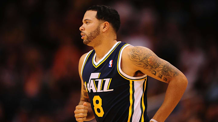 Oct. 12, 2010; Phoenix, AZ, USA; Utah Jazz guard (8) Deron Williams against the Phoenix Suns during a preseason game at the US Airways Center. Mandatory Credit: Mark J. Rebilas-Imagn Images